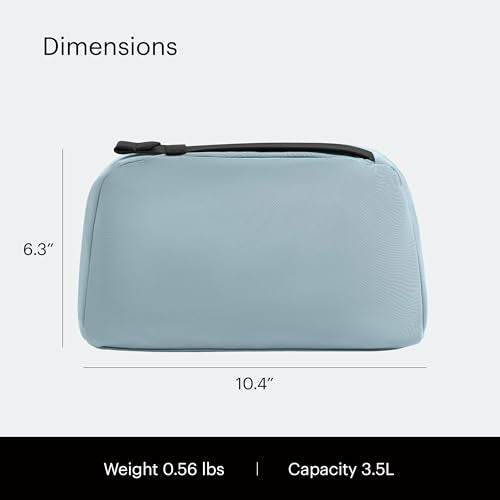 Away Amazon Exclusive Large Toiletry Bag - Water-Repellent Travel Toiletry Bag with Clamshell Opening, Interior Compartments, Exterior Zip Pocket - Sky Blue
