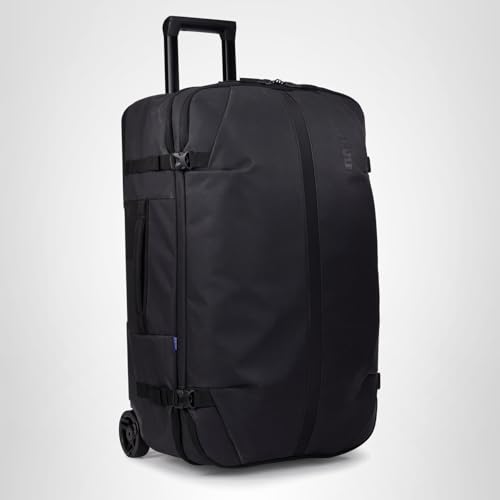 Thule Aion 70cm Wheeled Duffel - Wet/Dirty storage pocket - Smooth rolling wheels - Interior compression straps - Lockable exterior zippers - 100% recycled fabrics - Waxed, PFC-free fabric