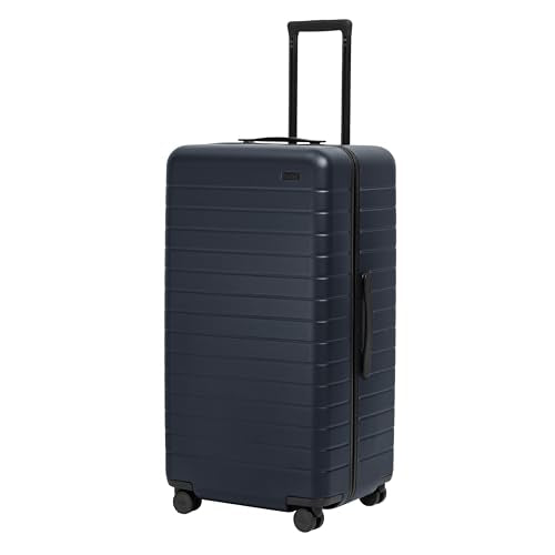 Away Trunk Checked Luggage - 31-Inch Lightweight Hardside Suitcase with 360° WhisperGlide Spinner Wheels, Interior Compression System, TSA-Accepted Lock - Navy Blue