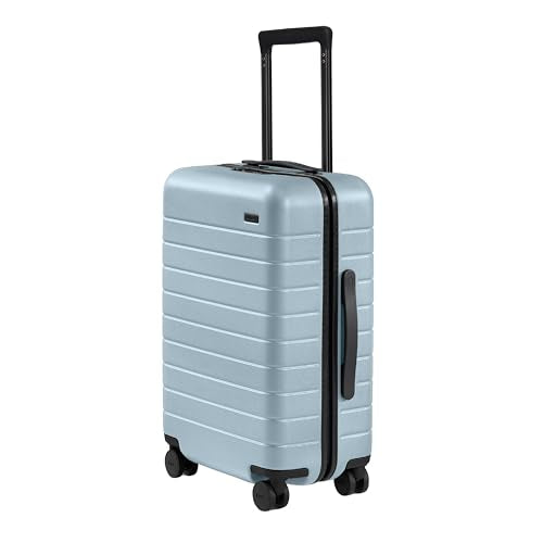 Away Amazon Exclusive Bigger Carry-On Luggage - 23-Inch Lightweight Hardside Suitcase with 360° Spinner Wheels, Interior Compression System, TSA-Approved Lock - Sky Blue