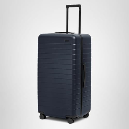 Away Trunk Checked Luggage - 31-Inch Lightweight Hardside Suitcase with 360° WhisperGlide Spinner Wheels, Interior Compression System, TSA-Accepted Lock - Navy Blue