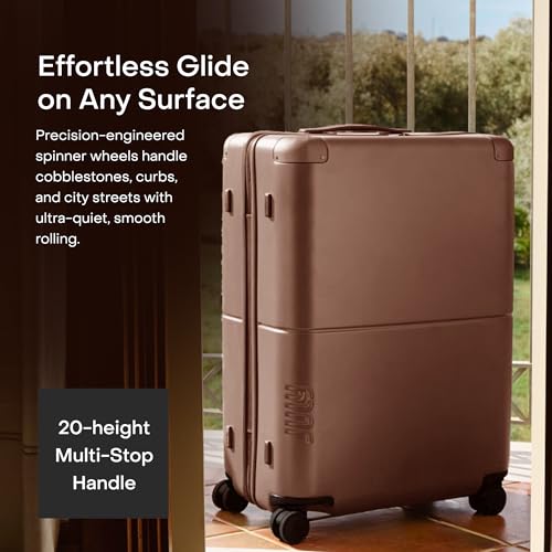 July Checked Plus with CaseSafe - 28.75" Built in Tracking, Airline Approved Check In Luggage with Wheels, Rolling Suitcase for Men & Women - Silent Spinner Wheels, Y-Strap - Dark Brown