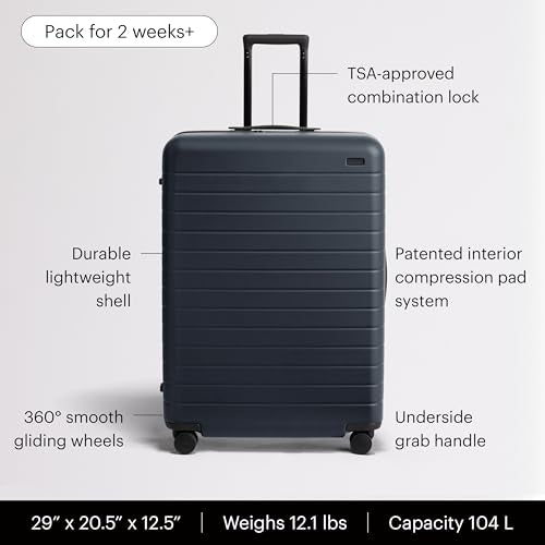 Away Large Checked Luggage - 29-Inch Lightweight Hardside Suitcase with Four WhisperGlide 360° Spinner Wheels, Interior Compression System, TSA-Accepted Lock - Navy Blue