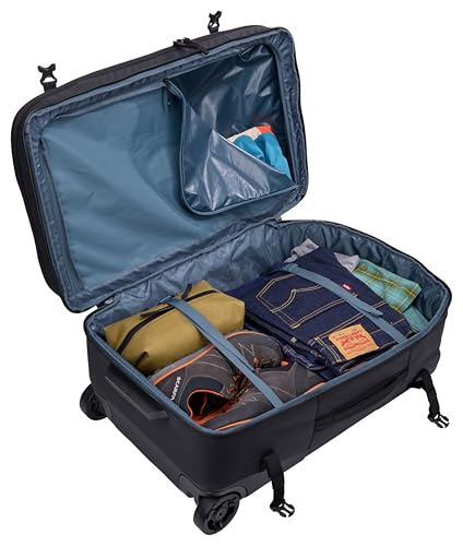 Thule Aion 70cm Wheeled Duffel - Wet/Dirty storage pocket - Smooth rolling wheels - Interior compression straps - Lockable exterior zippers - 100% recycled fabrics - Waxed, PFC-free fabric