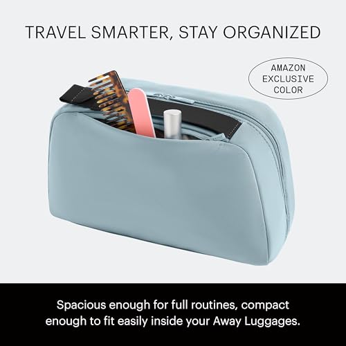 Away Amazon Exclusive Large Toiletry Bag - Water-Repellent Travel Toiletry Bag with Clamshell Opening, Interior Compartments, Exterior Zip Pocket - Sky Blue