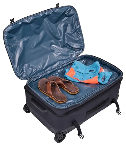 Thule Aion 70cm Wheeled Duffel - Wet/Dirty storage pocket - Smooth rolling wheels - Interior compression straps - Lockable exterior zippers - 100% recycled fabrics - Waxed, PFC-free fabric