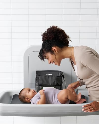 Skip Hop Travel Baby Changing Pad with Easy-Clean Surface, Covers Public Changing Stations, Wipes Pocket, Diaper Storage, Disposable Bag Dispenser and Magnetic Wipes Pocket, Clean Slate, Oat
