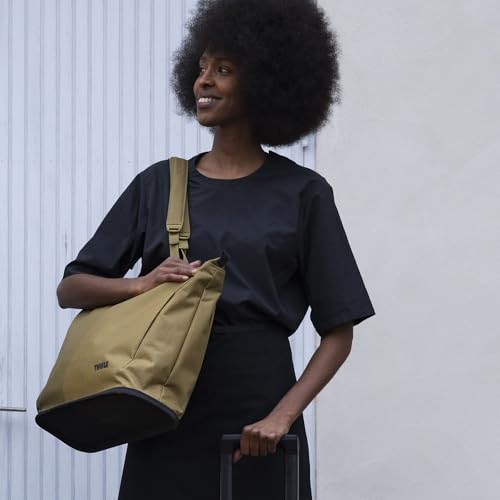 Thule Aion Tote Bag - 100% recycled PFC-free waxed canvas fabric - Detachable inner sling included - 16" padded laptop sleeve - Wet/dry pocket - Internal bottle pocket
