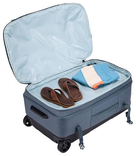 Thule Aion 70cm Wheeled Duffel - Wet/Dirty storage pocket - Smooth rolling wheels - Interior compression straps - Lockable exterior zippers - 100% recycled PFC-free waxed canvas fabric