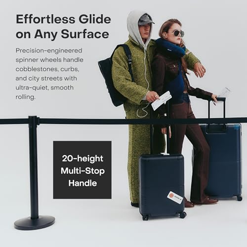 July Checked with CaseSafe - 24.5" Built in Tracking, Airline Approved Check In Luggage with Wheels, Spinner Suitcase for Men & Women - Rolling Suitcase, Spinner Wheels, Y-Strap - Navy