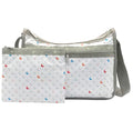 LeSportsac Sunlit Bubbles Deluxe Everyday Crossbody Bag + Cosmetic Bag, Style 7507/Color E553, Crisp White w Playful Bubbles, Vibrant Shades of Red, Blue, Orange, Muted Shades of Pink, Lt Blue & Khaki