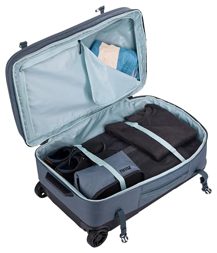 Thule Aion 70cm Wheeled Duffel - Wet/Dirty storage pocket - Smooth rolling wheels - Interior compression straps - Lockable exterior zippers - 100% recycled PFC-free waxed canvas fabric