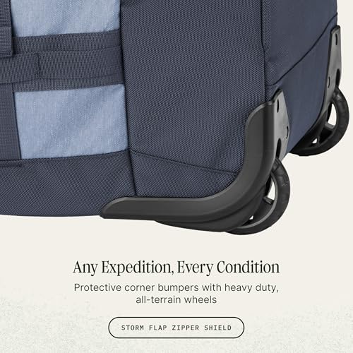 Eagle Creek Cargo Hauler XT Wheeled Duffel - Wheeled Backpack Duffel - Deployable Backpack Straps - Lockable U-Lid & Easy Access Compartment - 29" - Glacier Blue