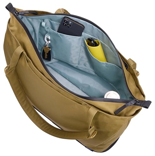 Thule Aion Tote Bag - 100% recycled PFC-free waxed canvas fabric - Detachable inner sling included - 16" padded laptop sleeve - Wet/dry pocket - Internal bottle pocket