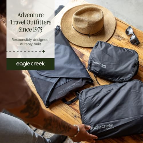 Eagle Creek Pack-It Reveal Garment Folder - Travel Garment Bag with Compression Wings to Maximize Luggage Space - Convenient Top Handle - Quick Drying Material - Black - Medium