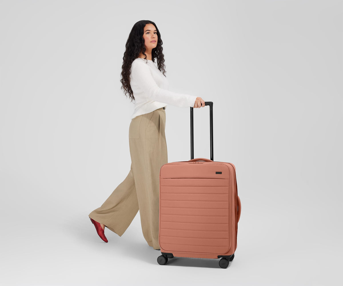 Away Softside Medium Checked Suitcase, 26 Inch Expandable Luggage For Men & Women, Durable Nylon Exterior, TSA Approved Lock, Ideal For Trips 1-2 Weeks, Jet Black