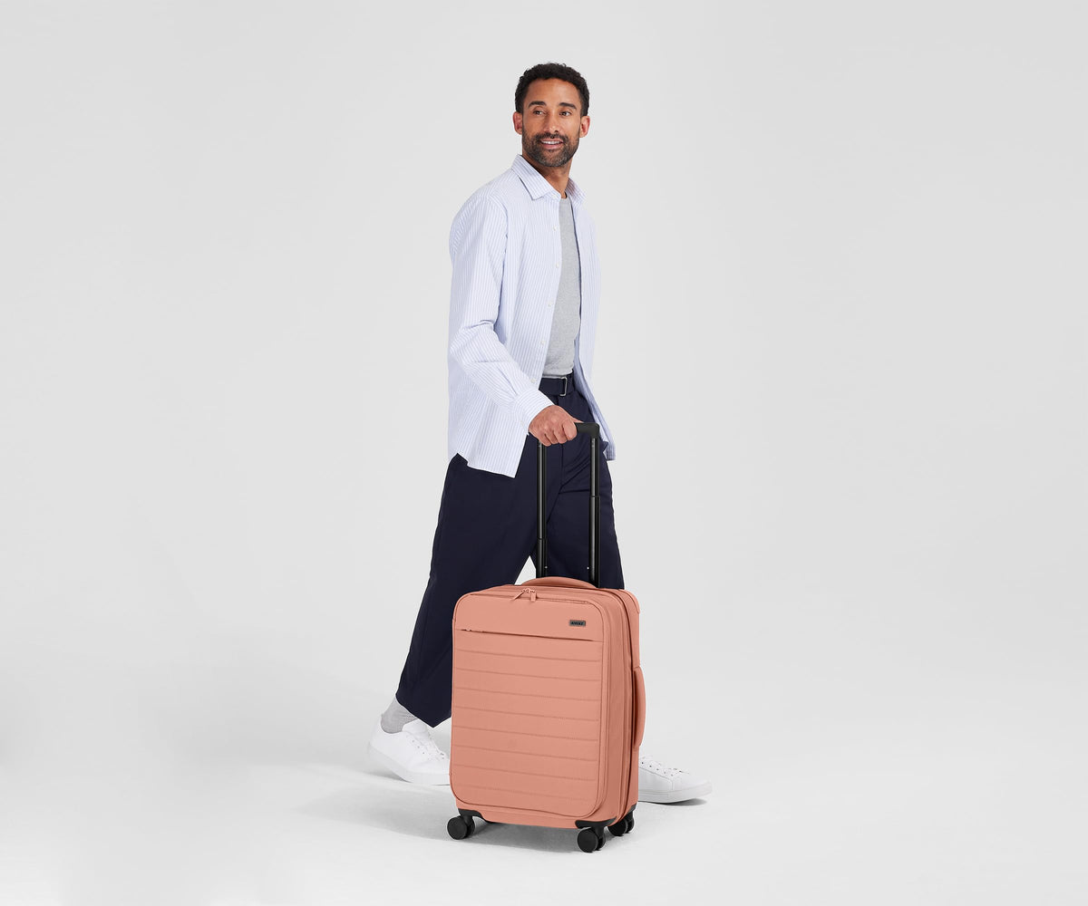 Away Softside Bigger Carry-On Suitcase, 23 Inch Expandable High-Strength Nylon Luggage With Spinner Wheels, Meets Requirements for Most Major Airlines, Coast Blue