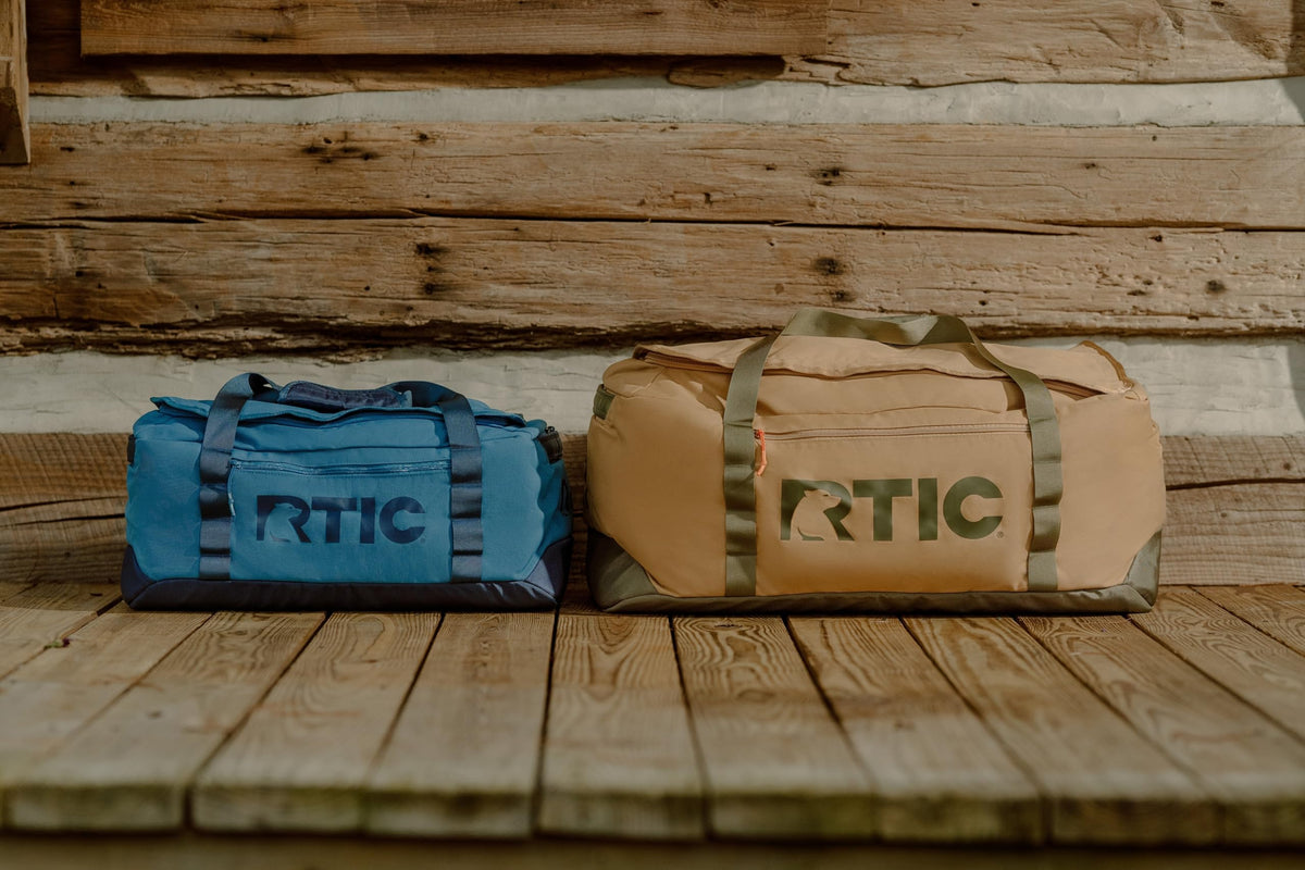 RTIC Road Trip Duffle Bag for Men and Women, Traveling Tote for Camp, Travel, Gym, Weekender, Camping, Overnight, Carry On, Sports, Spacious, Water Resistant, Medium, Olive & Beach