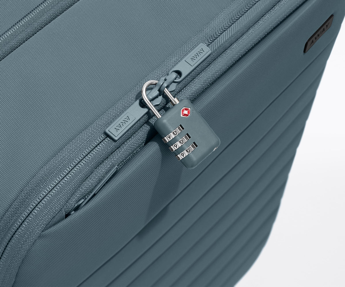 Away Softside Bigger Carry-On Suitcase, 23 Inch Expandable High-Strength Nylon Luggage With Spinner Wheels, Meets Requirements for Most Major Airlines, Coast Blue