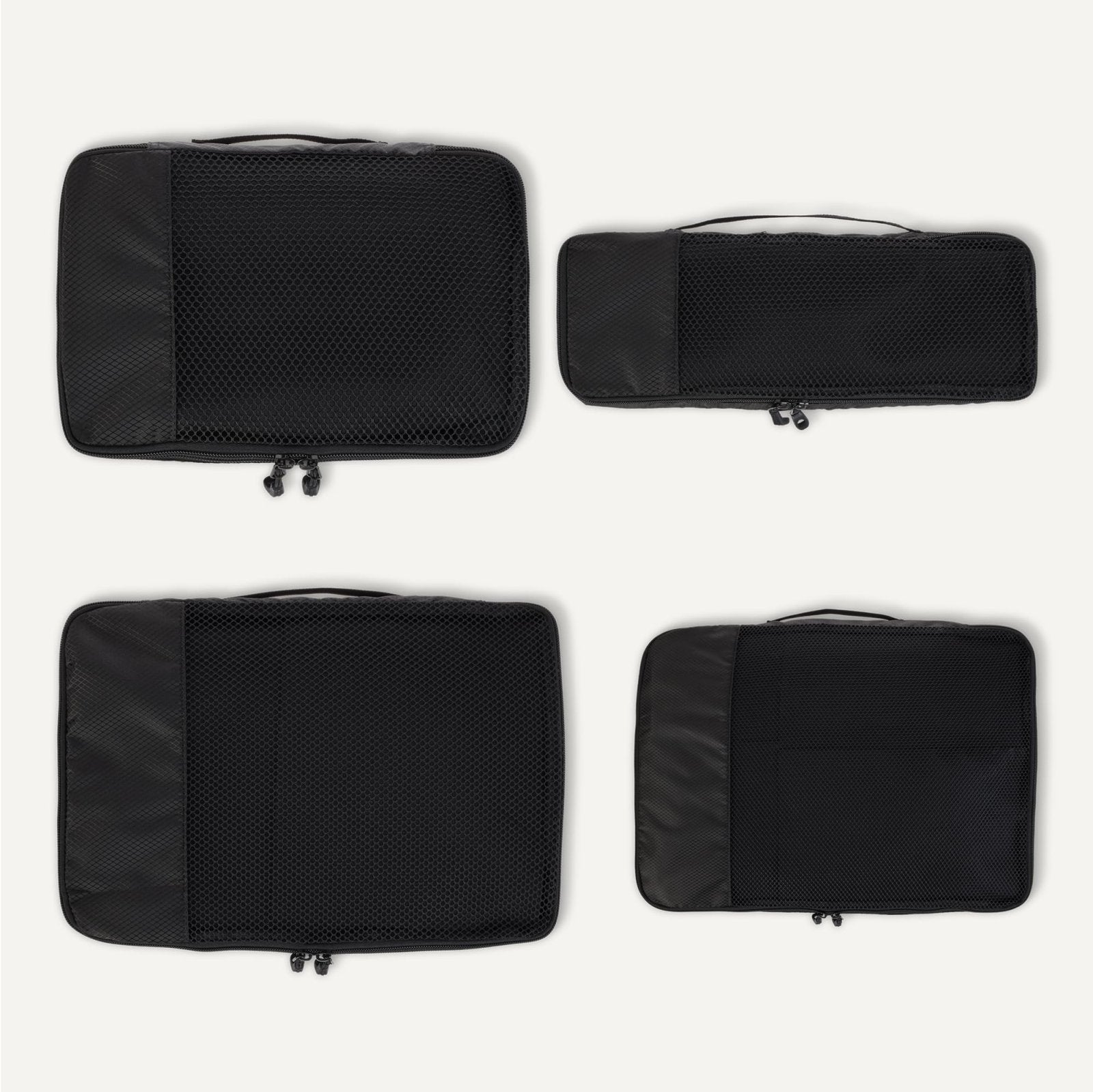 Amazon Essentials 4 - Piece Space - Saving Packing Cubes Travel Accessories Set, Luggage Organizer with Double Zipper, Mesh Top, Small/Medium/Large/Slim, Black (Previously Amazon Basics)