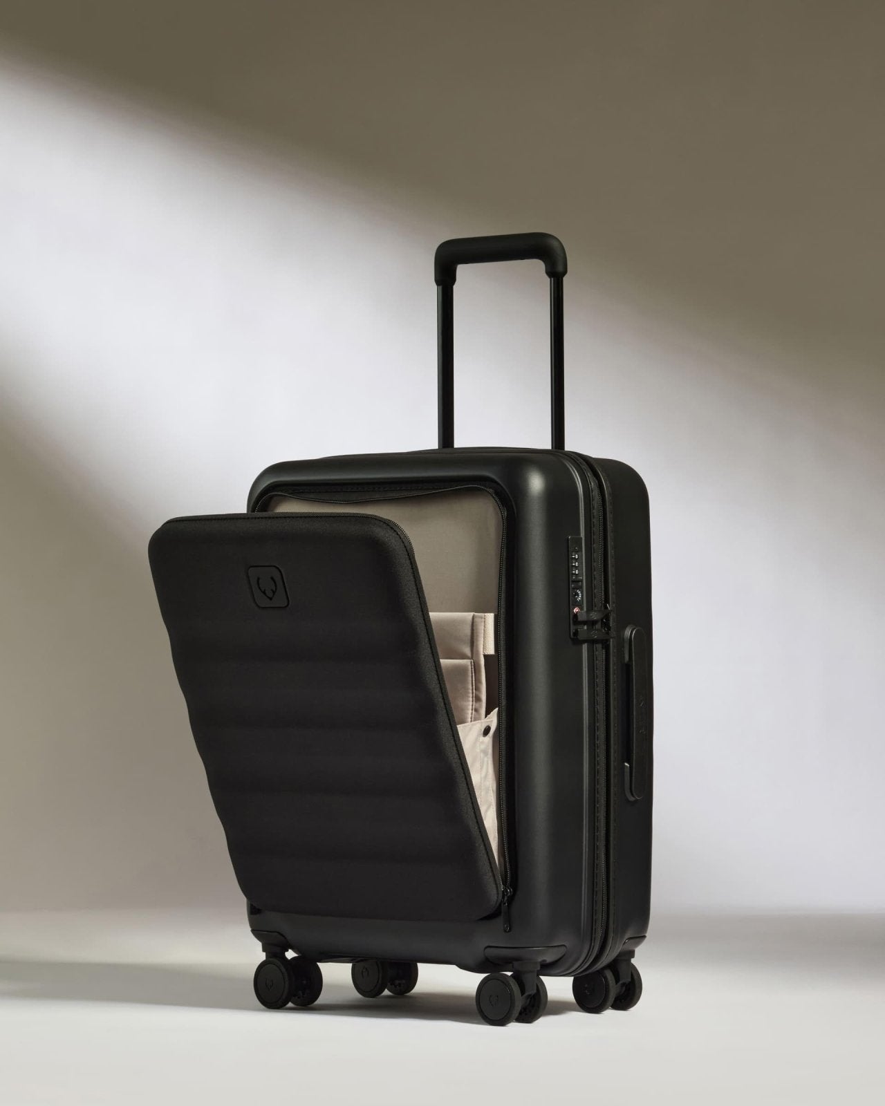 ANTLER - Icon Stripe Hardside Carry On Luggage with Pocket, 21.7x15.7x9.4 Inch, 47L - Lightweight, 4 Spinner Wheels, Adjustable Handle, External Front Pocket, Small Suitcase, TSA Lock - Black