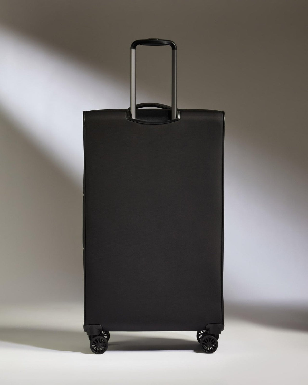 ANTLER - Soft Stripe Large Luggage - 31" Softside Suitcase, Durable, Lightweight & Expandable, 4 Spinner Wheels - Adjustable Handle, TSA Lock, Black