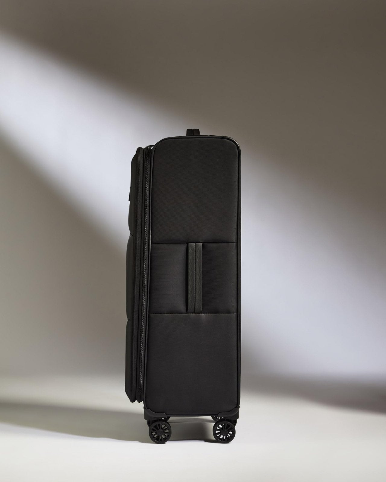 ANTLER - Soft Stripe Large Luggage - 31" Softside Suitcase, Durable, Lightweight & Expandable, 4 Spinner Wheels - Adjustable Handle, TSA Lock, Black