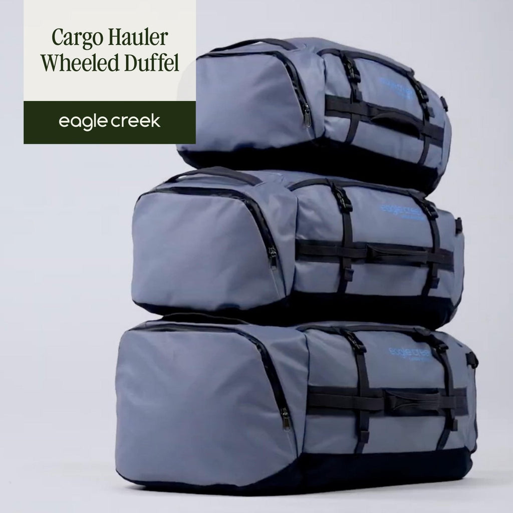 Eagle Creek Cargo Hauler Wheeled Duffel - Durable Duffel Bag for Travel - Easy Access Compartment - Deployable Backpack Straps - Lockable Zipper Opening - Iron Orange - 110L