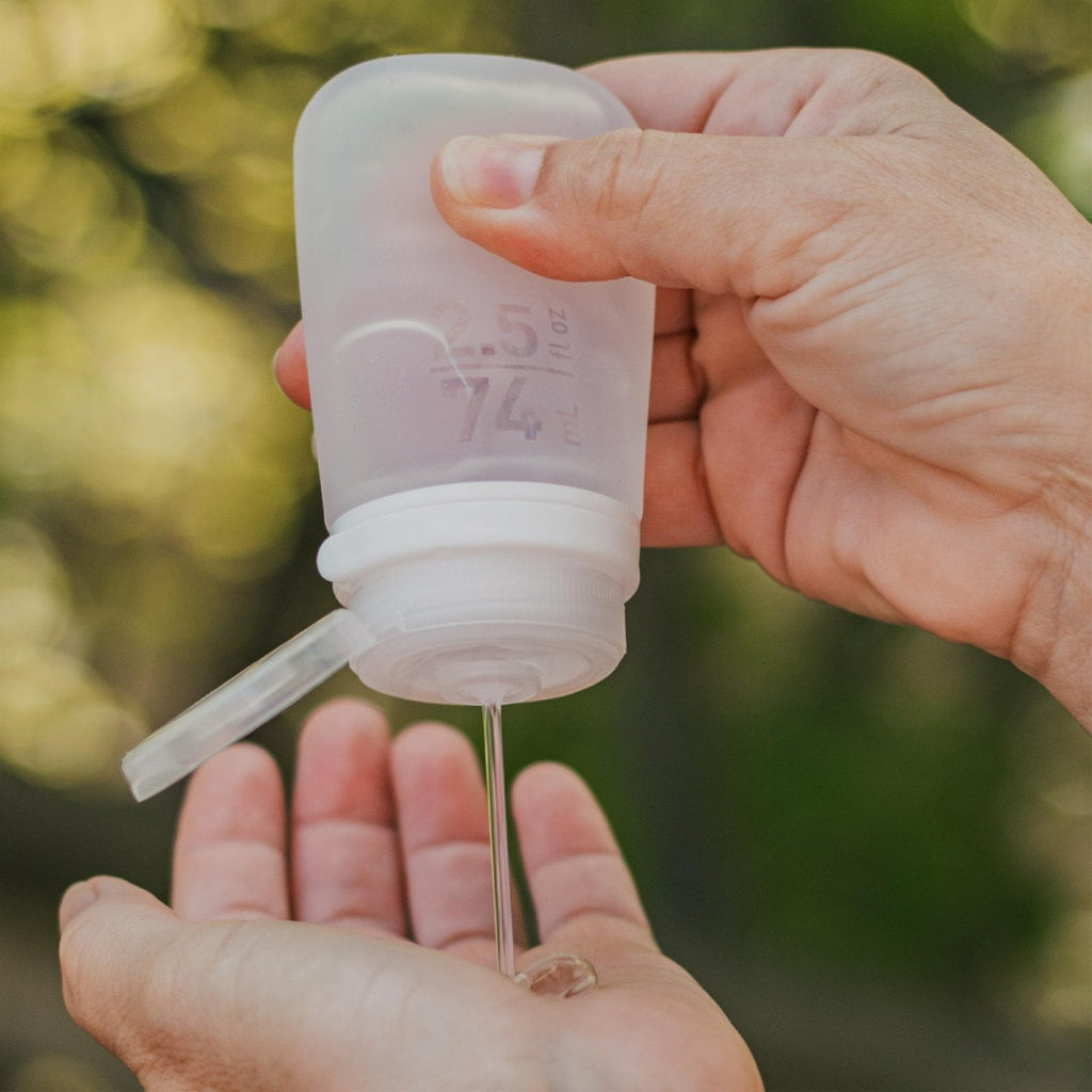 humangear GoToob+ (Medium) | Refillable Silicone Travel Bottle | Locking Lid | Food - Safe Material | Clear, Medium (2.5 fl.oz.; 74ml)