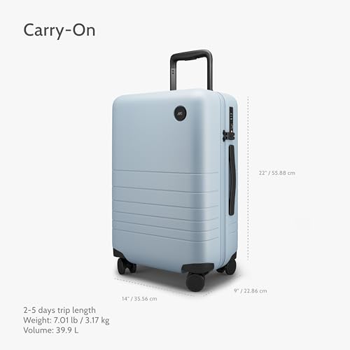 Monos Carry-On Luggage 22 Inch – Lightweight Hardside Spinner Suitcase with TSA Lock | Airline Approved, 39.9L Polycarbonate Rolling Carry On Bag | Overhead Bin Suitcase for Travel | Blue Haze