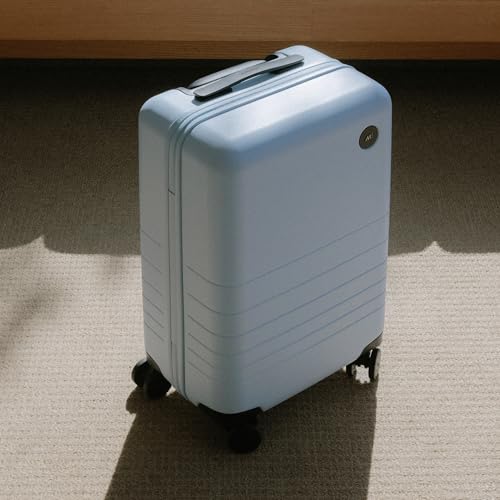 Monos Carry-On Luggage 22 Inch – Lightweight Hardside Spinner Suitcase with TSA Lock | Airline Approved, 39.9L Polycarbonate Rolling Carry On Bag | Overhead Bin Suitcase for Travel | Blue Haze