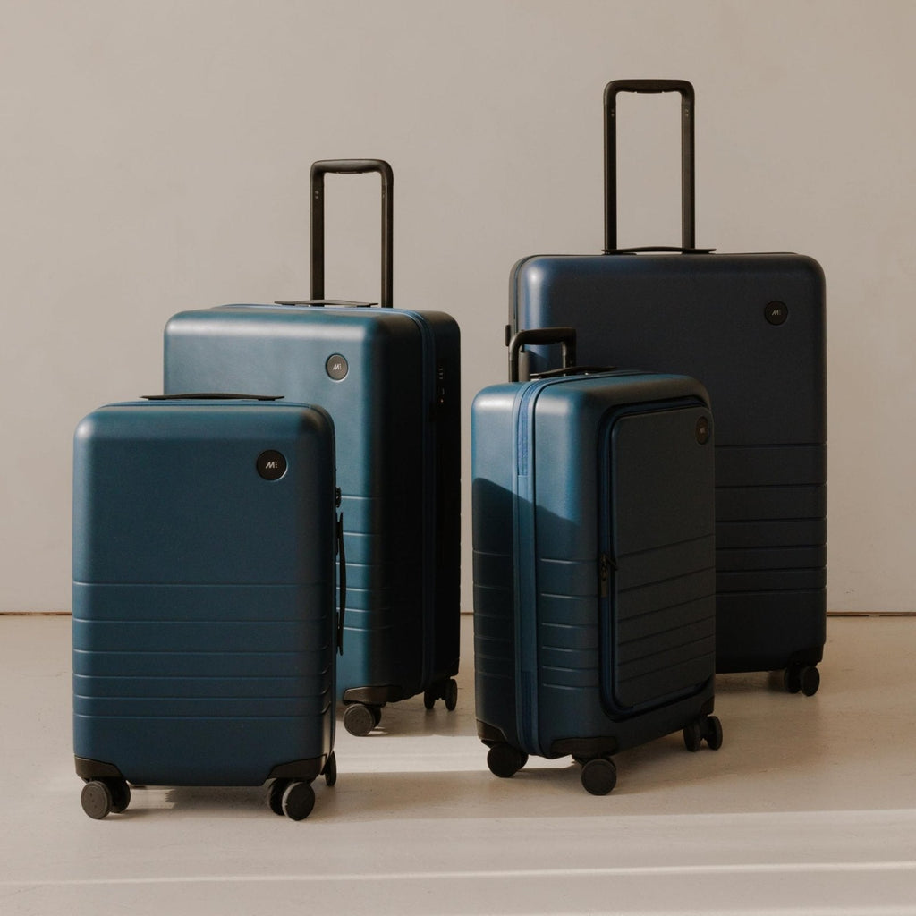 Monos Carry - On Plus Luggage (23"), Lightweight Hardside Spinner Suitcase with TSA Lock, Airline Approved, Ocean Blue