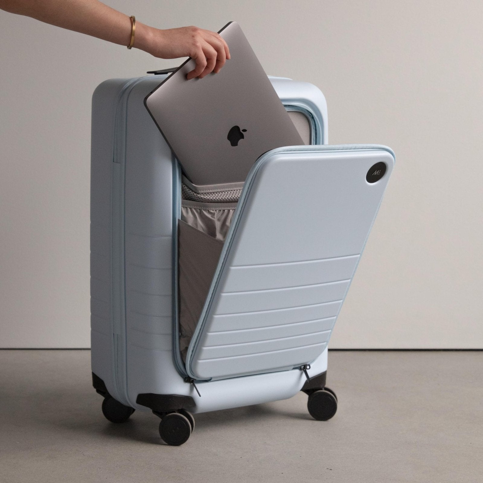 Monos Carry - On Pro Plus Luggage (23"), Hardside Spinner Suitcase with TSA Lock & Front Pocket, Airline Approved, Ocean Blue