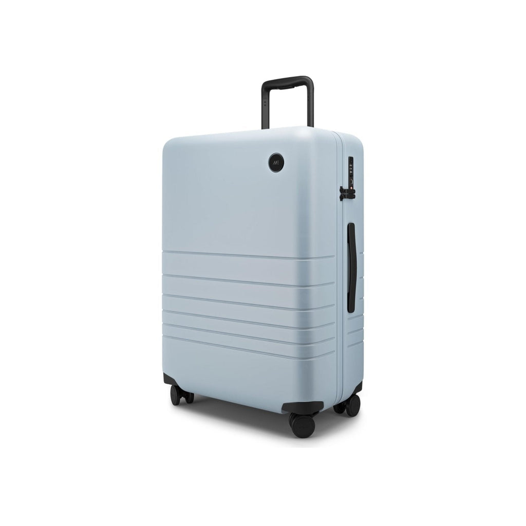 Monos Medium Checked Luggage (26.5"), Lightweight Hardside Spinner Suitcase with TSA Lock, Durable Travel Case, Blue Haze