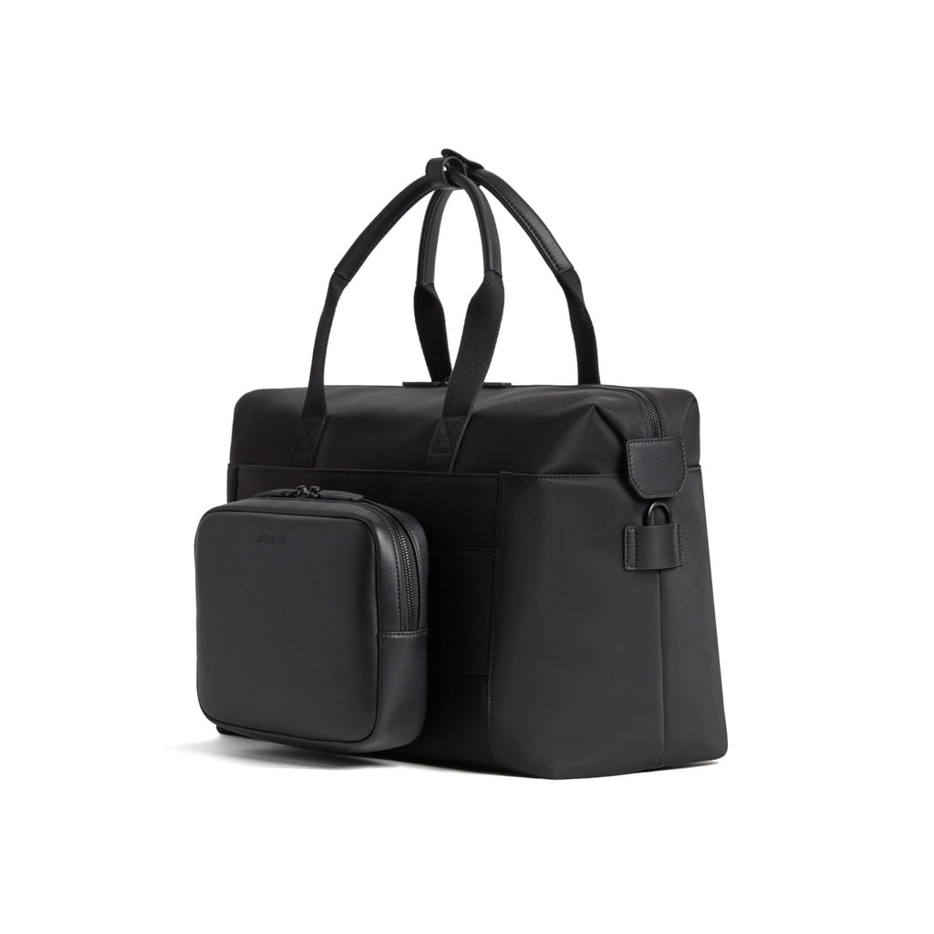 Monos Metro Duffel Nylon, Travel Duffel Bag & Weekender with Shoe Compartment, Lightweight Carry-On Approved, Carbon Black