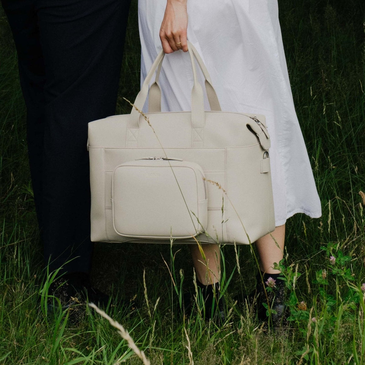 Monos Metro Duffel Vegan Leather Microfiber, Travel Duffel Bag & Weekender with Shoe Compartment, Carry - On Approved, Ivory