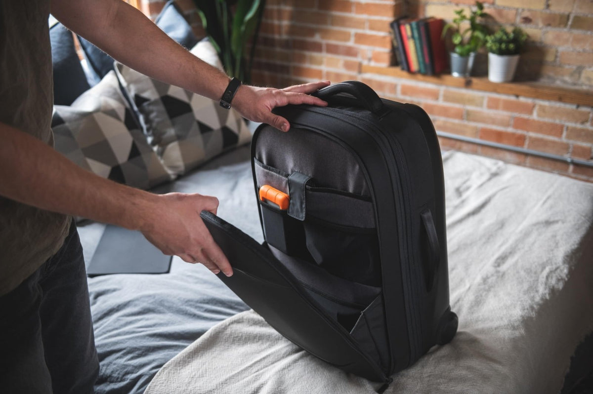 NOMATIC Navigator Carry - On 37L w/ 8L Built - In Expansion - Anti - Theft Carry - On for Airplane Travel - Premium Hardshell Roller Luggage, 17" Laptop Compartment, Black