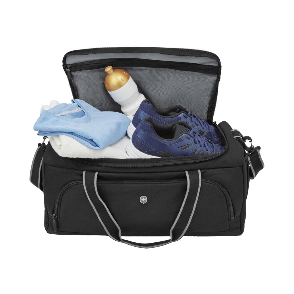 Victorinox Voyage 19" Travel Duffel - Spacious Duffel for Travel & Gym - Overnight Bag - Lightweight & Durable - Adjustable Padded Shoulder Strap - Front Pocket - Black